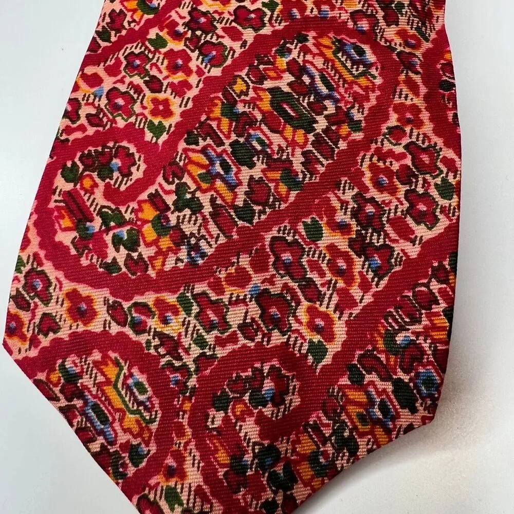 Liberty of London vintage red patterned silk necktie features a vibrant tie
